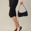 The Bisou Perle Beaded shoulder bag