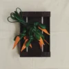 The carrot Knotted carrot-shaped bag charm The carrot Knotted carrot-shaped bag charm