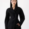 The Curvo coat Round-shoulder coat