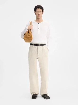 The Fernando de-Nîmes denim pants Crocodile-embossed jeans