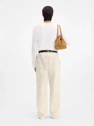 The Fernando de-Nîmes denim pants Crocodile-embossed jeans
