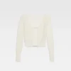 The Jacquemus cardigan Fluffy charm logo cardigan The Jacquemus cardigan Fluffy charm logo cardigan