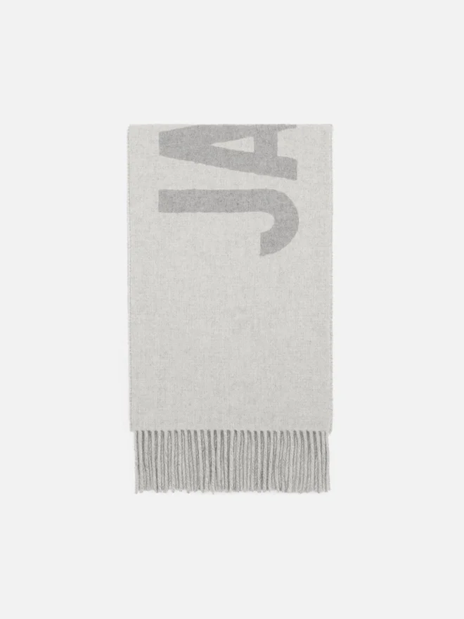The Jacquemus scarf Fringe logo scarf The Jacquemus scarf Fringe logo scarf