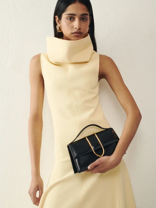 The large Bambino Cross-body metal flap bag The large Bambino Cross-body metal flap bag