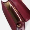 The large Bambino Cross-body metal flap bag The large Bambino Cross-body metal flap bag