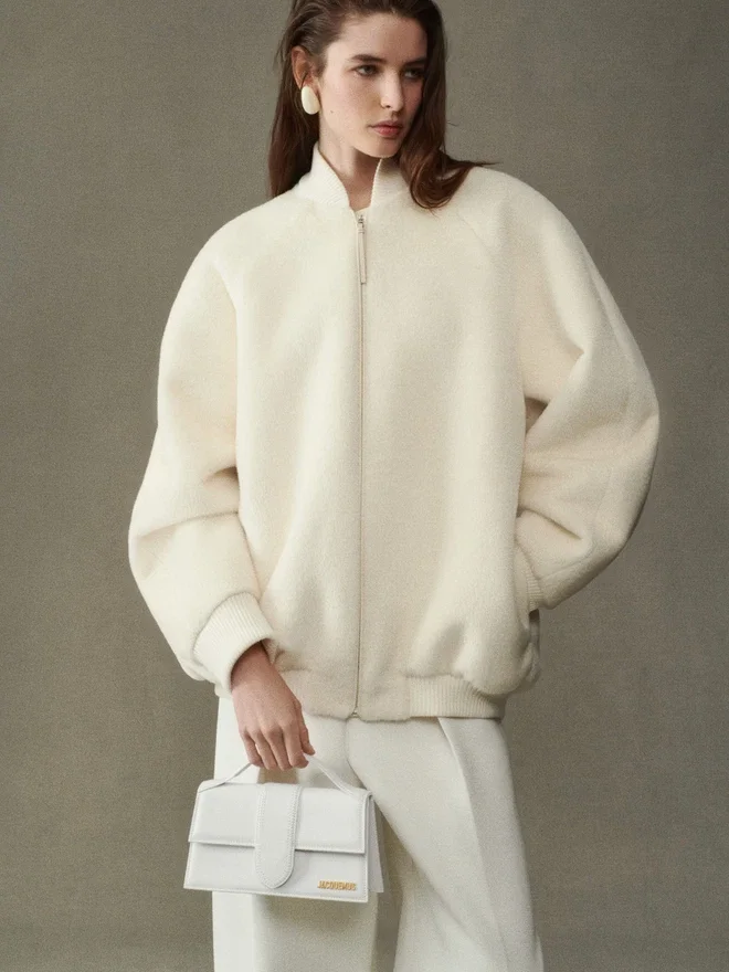 The large Bambino Handbag with adjustable crossbody strap The large Bambino Handbag with adjustable crossbody strap