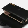 The large Bambino Handbag with adjustable crossbody strap The large Bambino Handbag with adjustable crossbody strap