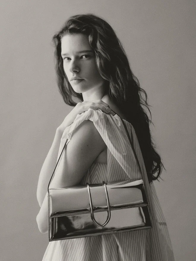 The long Bambino Long metal flap bag The long Bambino Long metal flap bag