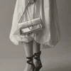 The long Bambino Long metal flap bag The long Bambino Long metal flap bag