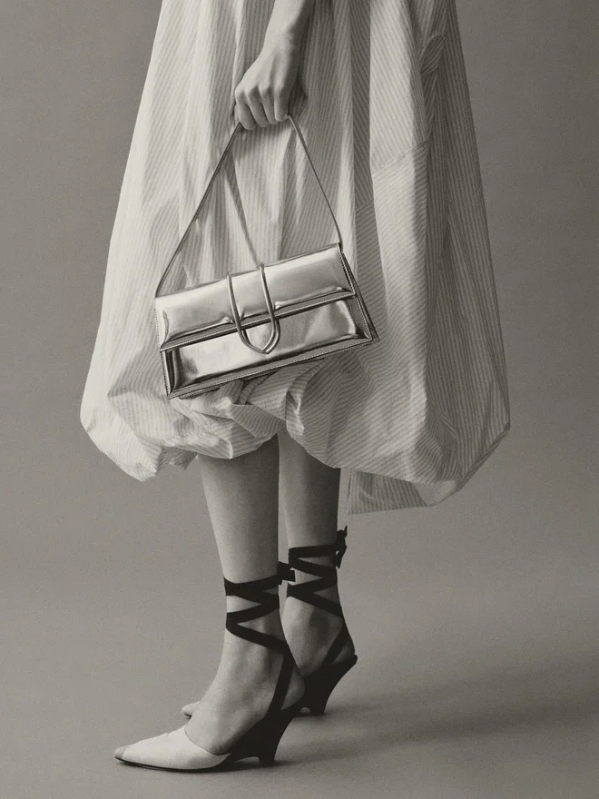 The long Bambino Long metal flap bag The long Bambino Long metal flap bag