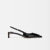 The low Duelo slingbacks Circle and square kitten heels The low Duelo slingbacks Circle and square kitten heels
