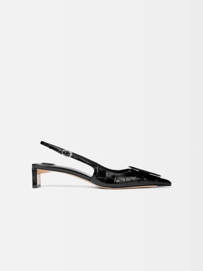 The low Duelo slingbacks Circle and square kitten heels The low Duelo slingbacks Circle and square kitten heels