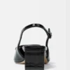 The low Duelo slingbacks Circle and square kitten heels The low Duelo slingbacks Circle and square kitten heels