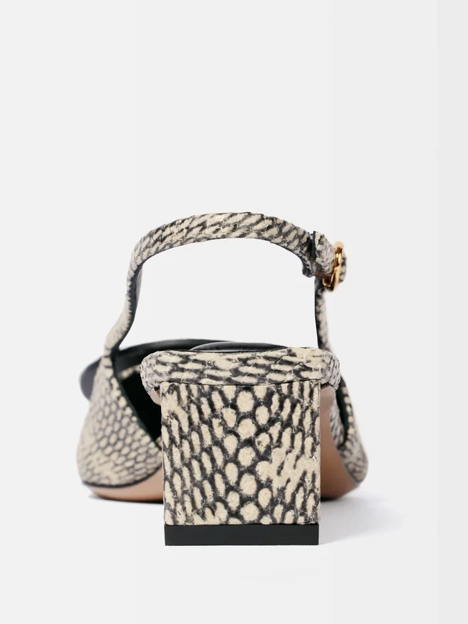 The low Duelo slingbacks Circle and square kitten heels The low Duelo slingbacks Circle and square kitten heels