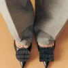 The low Duelo slingbacks Circle and square kitten heels The low Duelo slingbacks Circle and square kitten heels