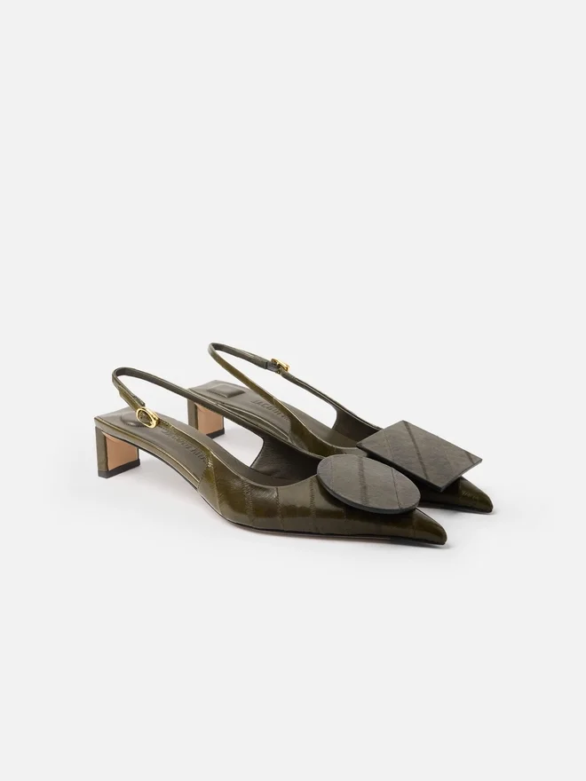 The low Duelo slingbacks Circle and square kitten heels The low Duelo slingbacks Circle and square kitten heels