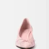 The low Tourni heels Low twisted pumps