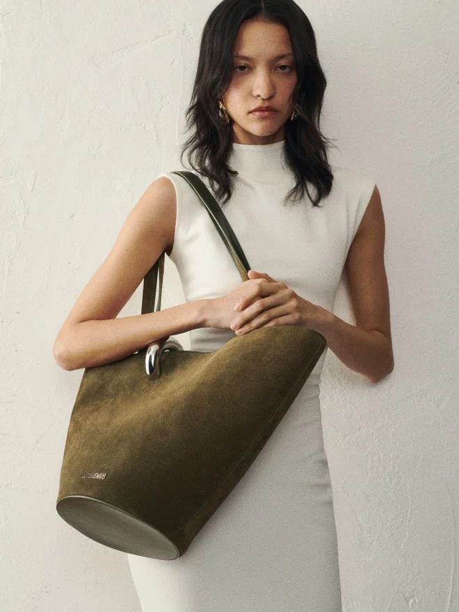The medium Bambola Medium asymmetric bucket bag The medium Bambola Medium asymmetric bucket bag