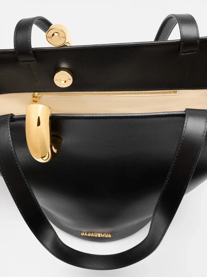 The medium Bambola Medium asymmetric bucket bag The medium Bambola Medium asymmetric bucket bag