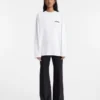 The Montaigne address long-sleeve t-shirt Long sleeve t-shirt with printed address and logo – sold exclusively online and in our Paris store The Montaigne address long-sleeve t-shirt Long sleeve t-shirt with printed address and logo – sold exclusively online and in our Paris store