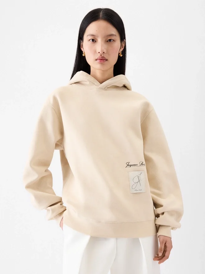 The Montaigne hoodie Logo hooded sweatshirt – sold exclusively online and in our Paris store The Montaigne hoodie Logo hooded sweatshirt – sold exclusively online and in our Paris store