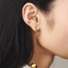 The Nodo earrings Asymmetric dangle earrings The Nodo earrings Asymmetric dangle earrings