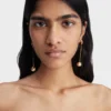 The Nodo earrings Rhinestoned dangle earrings