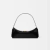 The Ovalo clutch Folded shoulder bag