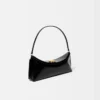 The Ovalo clutch Folded shoulder bag