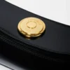 The Ovalo clutch Folded shoulder bag