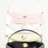 The Ovalo clutch Folded shoulder bag