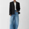 The Ovalo de-Nîmes denim pants High-waisted curved jeans The Ovalo de-Nîmes denim pants High-waisted curved jeans