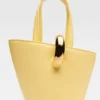 The small Bambola Asymmetric mini bucket bag