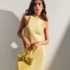 The small Bambola Asymmetric mini bucket bag