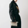 The small Rond Carré clutch Mini take-away pouch bag
