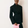 The small Rond Carré clutch Mini take-away pouch bag