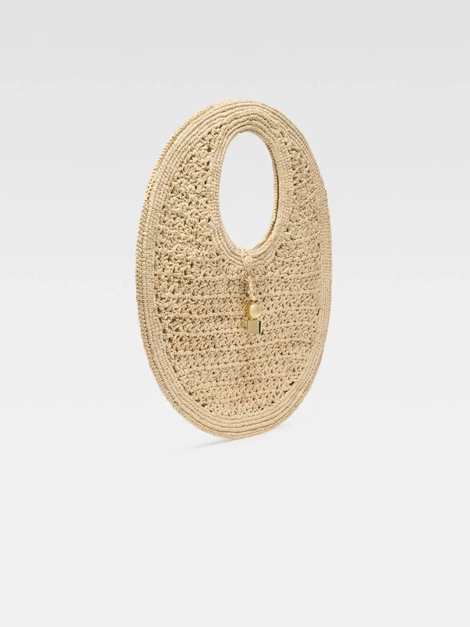 The Spiaggia round bag Raffia circle bag The Spiaggia round bag Raffia circle bag