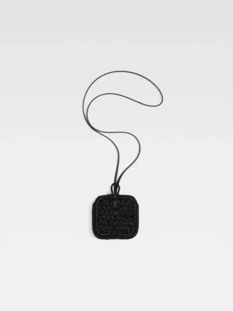 The Spiaggia wallet Raffia AirPods holder