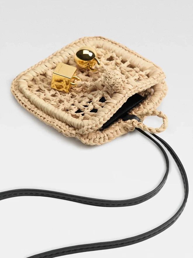 The Spiaggia wallet Raffia AirPods holder The Spiaggia wallet Raffia AirPods holder