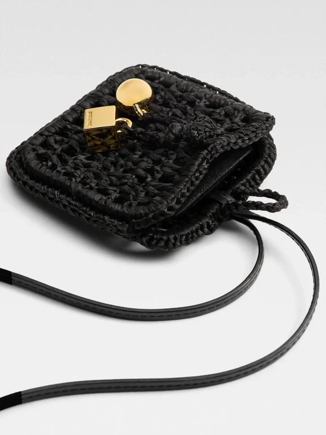The Spiaggia wallet Raffia AirPods holder The Spiaggia wallet Raffia AirPods holder