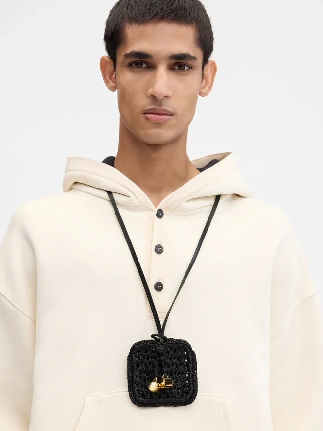 The Spiaggia wallet Raffia AirPods holder The Spiaggia wallet Raffia AirPods holder