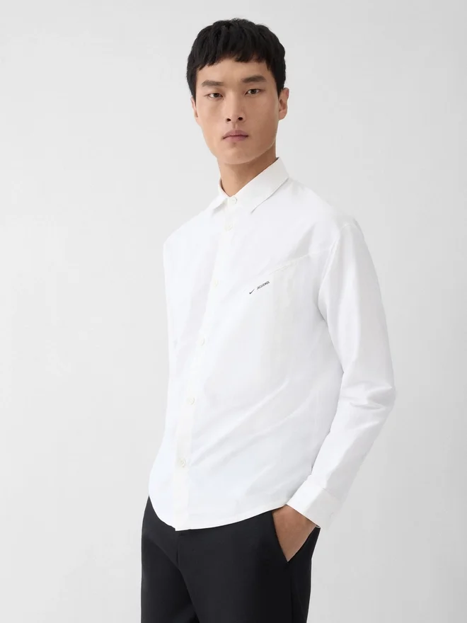 The tech shirt Jacquemus + Nike Technical shirt – Jacquemus + Nike collaboration The tech shirt Jacquemus + Nike Technical shirt – Jacquemus + Nike collaboration