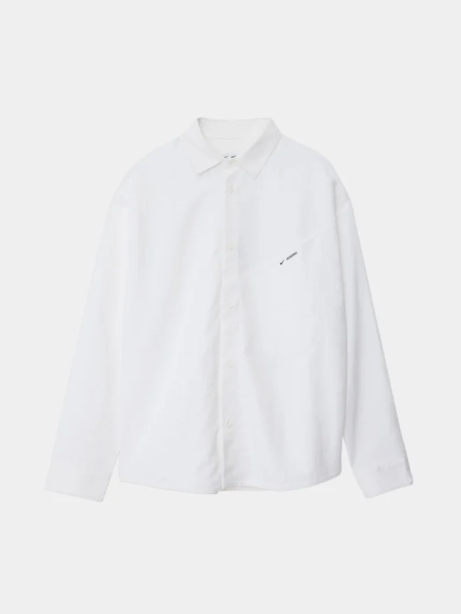 The tech shirt Jacquemus + Nike Technical shirt – Jacquemus + Nike collaboration The tech shirt Jacquemus + Nike Technical shirt – Jacquemus + Nike collaboration