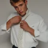 The tech shirt Jacquemus + Nike Technical shirt – Jacquemus + Nike collaboration The tech shirt Jacquemus + Nike Technical shirt – Jacquemus + Nike collaboration